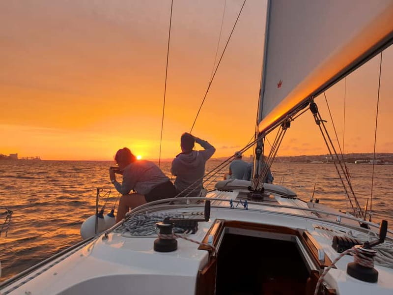 Lisbon: Daytime or Sunset Boat Cruise with History and Wine - Praça do Comércio, Chiado, and Time Out Market, the City Lights Approach