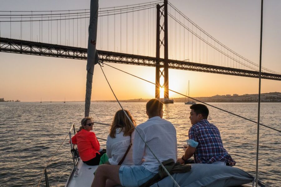 Lisbon: Daytime/Sunset/Night City Sailboat Tour with Drink - Music, photo moments, and the crew energy that makes it feel worth $41