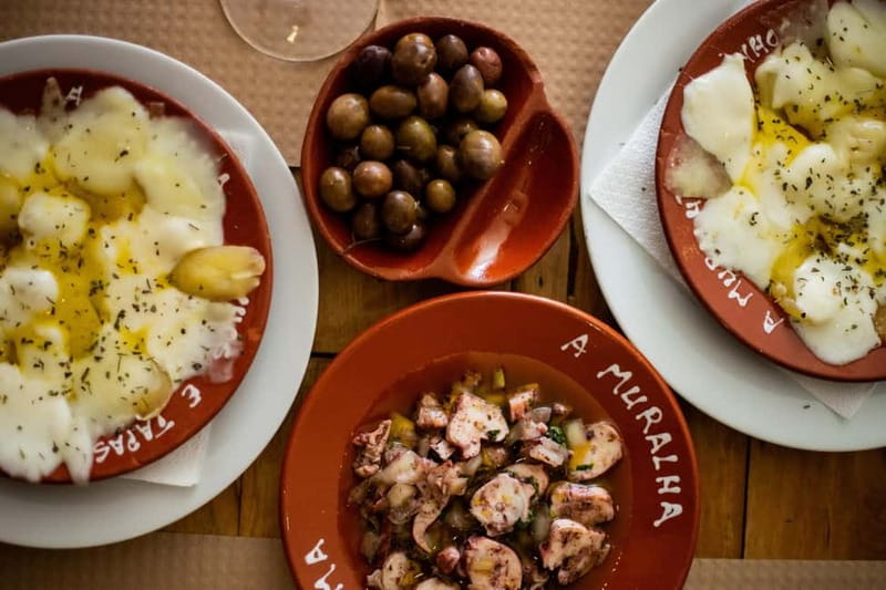 Lisbon: Food Tasting Tour by Tuk Tuk with 2 Stops - Your First Tastings in Baixa: Wine, Food, and a Real Portuguese Starting Point