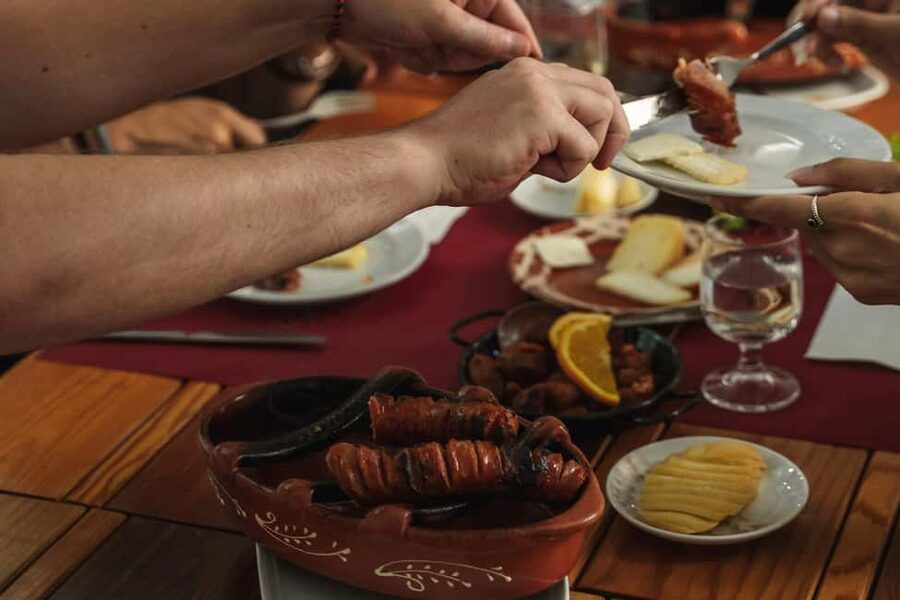 Lisbon: Food & Wine Walking Tour Through Baixa - What you eat: petiscos, street food like bifana, and classic dessert
