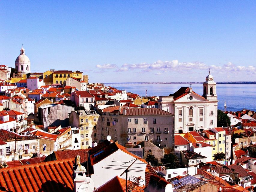 Lisbon: Full-Day Small-Group City Tour with Hotel Pickup - Passing Through Chiado: A Quick Taste of Central Lisbon