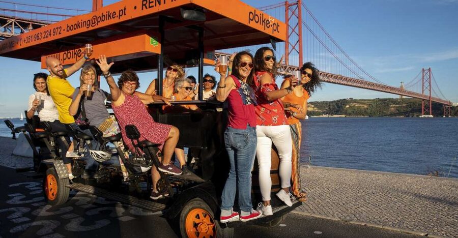 Lisbon: Fun Beer Bike by the Seafront - Under the 25 April Bridge: The Photo Stop That Breaks the Rhythm