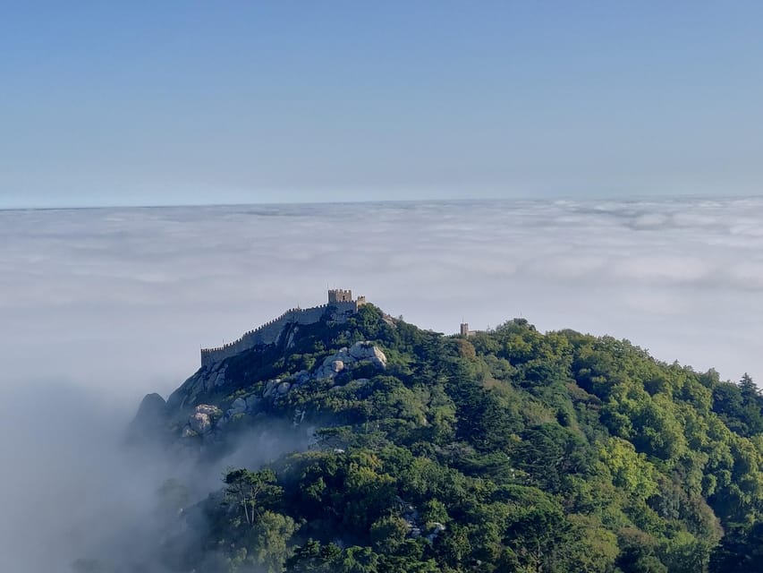 Lisbon: Half-Day Sintra Tour with Pena Palace and Regaleira - Meeting at Hard Rock Cafe and riding in comfort