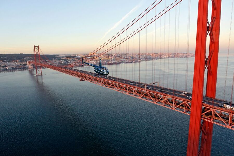 Lisbon: Helicopter Ride, Boat Trip, & Old Town Walking Tour - Helicopter ride from Belém area toward the 25th of April Bridge