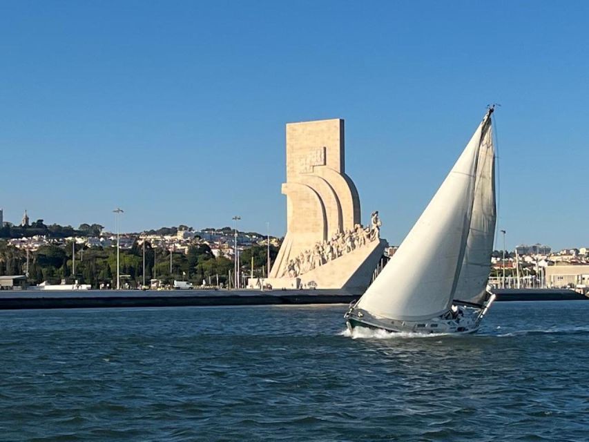 Lisbon: Private Sailing City & Sunset Tour - Christ the King viewed from the river side
