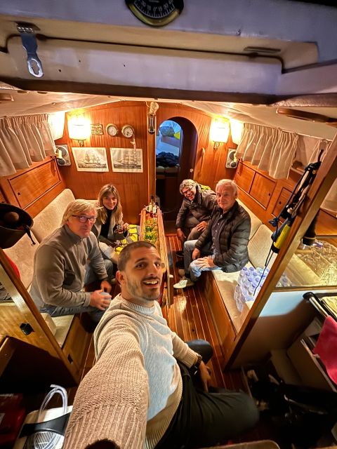 Lisbon: Private Sailing City & Sunset Tour - Getting started under the bridge at Lisbon Boat Tours