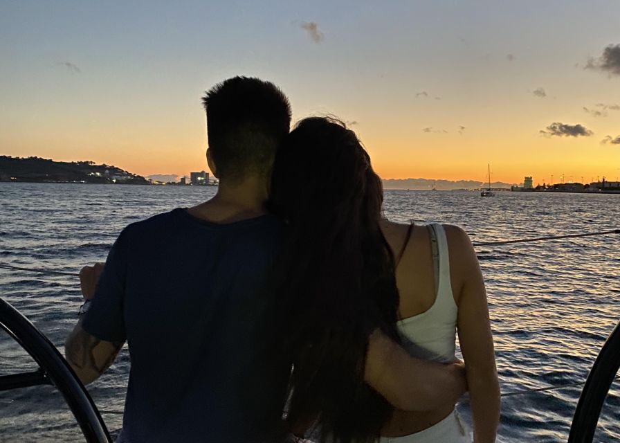 Lisbon: Private Tagus River Sunset Cruise on a Luxury Boat - On-board comfort: inside seating, blankets, snacks, and music