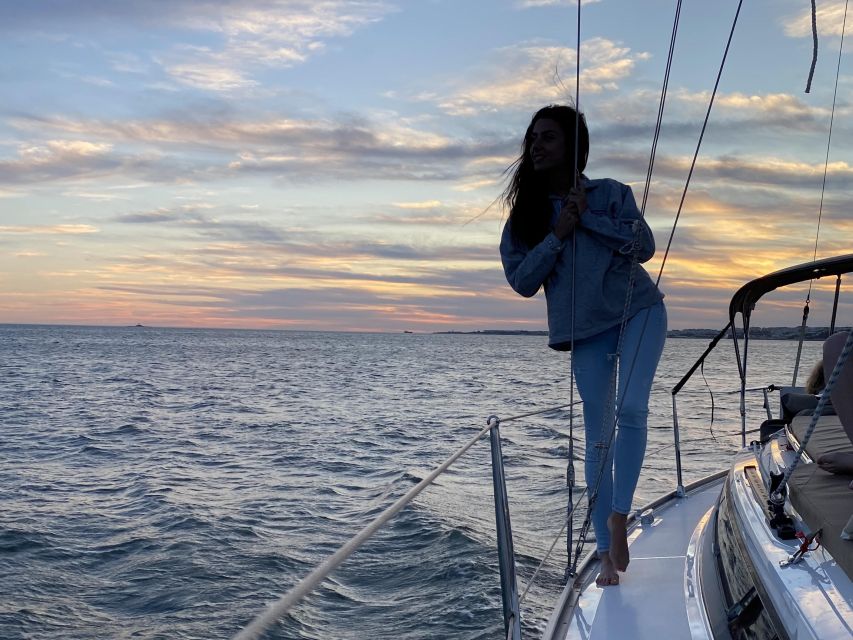 Lisbon: Private Tagus River Sunset Cruise on a Luxury Boat - Under the 25 de Abril Bridge: the moment the river feels huge