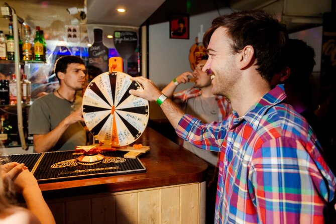 Lisbon: Pub Crawl with Open Bar, Shots & VIP Club Entry - Pink Street for 2 hours, when the crowd and music take over