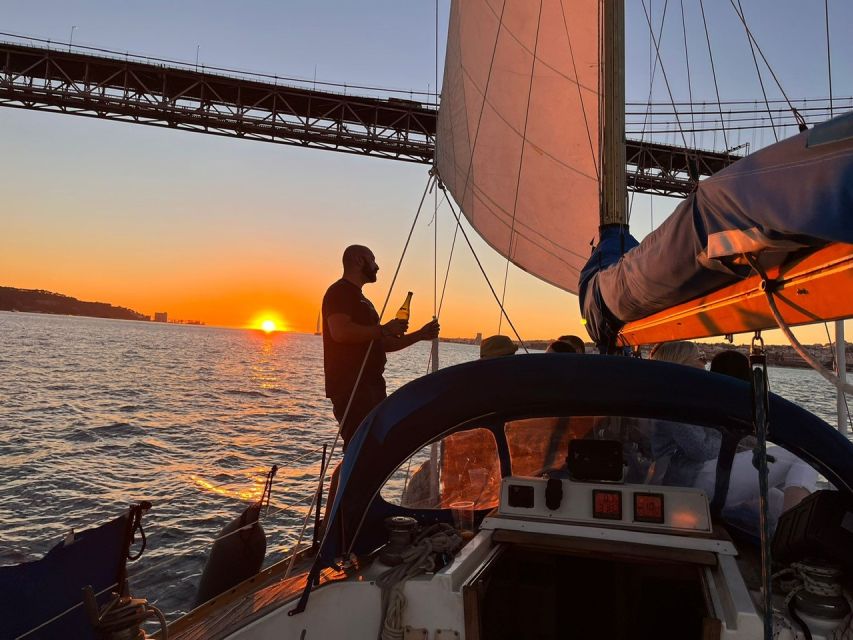 Lisbon: Sailboat Sunset Tour with a Drink - What to bring so the evening stays comfortable