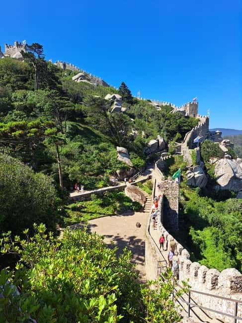 Lisbon: Sintra, Pena Palace, Moorish Castle & Regaleira Tour - Monserrate Palace Pass By: Worth Noticing Even From the Road
