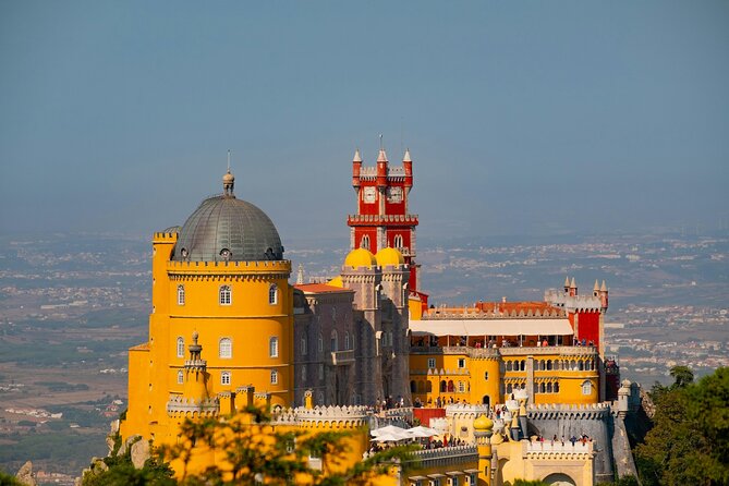 Lisbon: Sintra Private Day Trip with Pena Palace & Wine Tasting - Cabo da Roca cliffs, a Guincho Beach drive-by, and Cascais coastal return