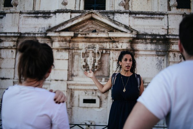 Lisbon Small-Group Food Tour with 18 Tastings in Alfama District - Chafariz DEl Rei: a fountain stop that adds context