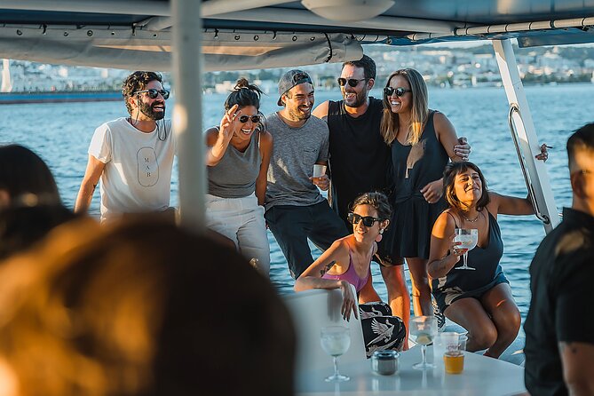 Lisbon : Sunset Catamaran Boat Tour with Music and Drinks - A medical research stop you’ll understand in one glance