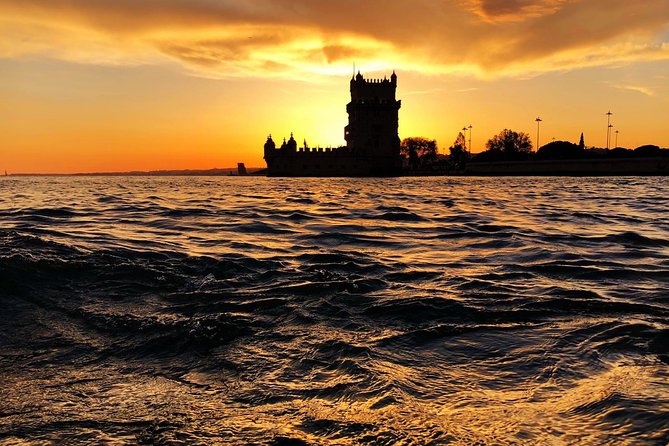 Lisbon: Sunset Cruise With Drinks on Spacious Yacht - The crew experience: friendly hosts and quick monument storytelling