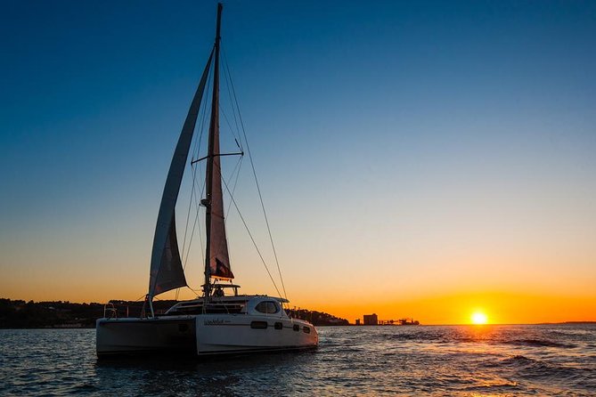 Lisbon: Sunset Cruise With Drinks on Spacious Yacht - The yacht setup: open deck space, comfy seating, and room to breathe