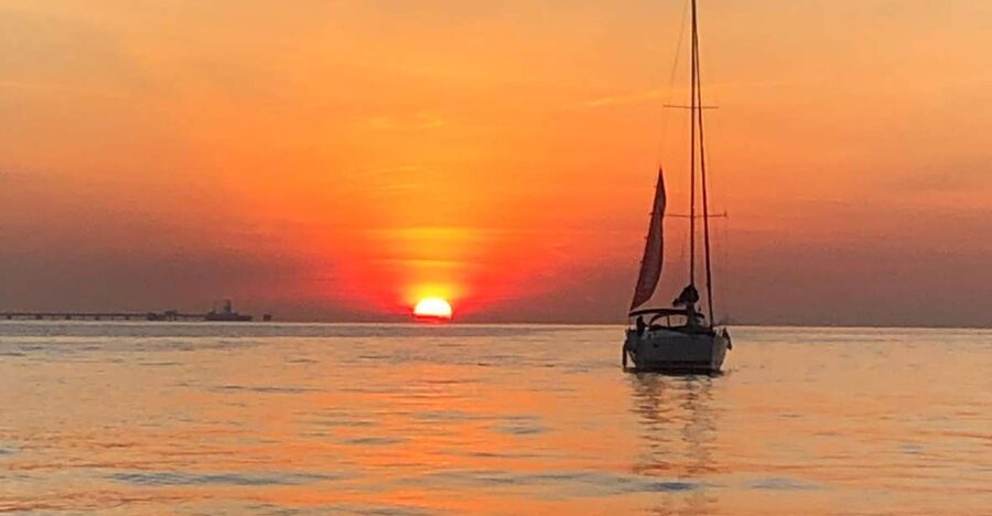 Lisbon: Sunset Cruise with Drinks - Belém Tower and the riverfront photo stops you will actually remember
