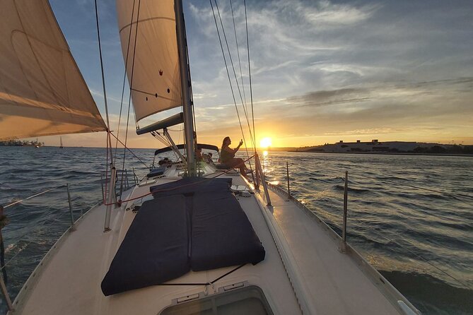 Lisbon Sunset Sailing with Portuguese Wine and History - St. George’s Castle and Alfama from the water, where hills become the point