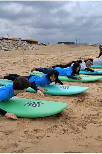Lisbon Surf Guide - Surf class & Pick Up - Small Groups And The Coach-In-Your-Spotlight Effect