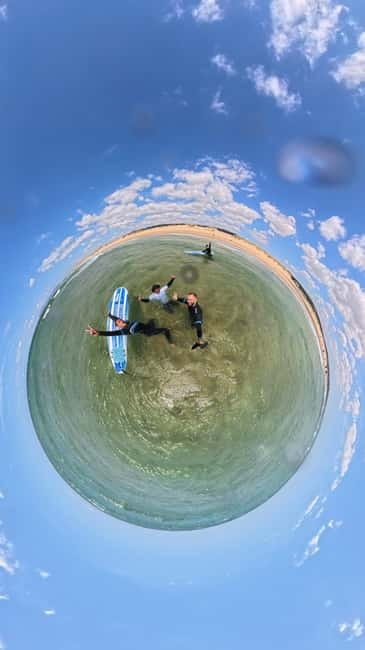 Lisbon: Surfing Lesson on Costa de Caparica Beach - What happens first on the beach: sand basics, wetsuits, and your first attempts