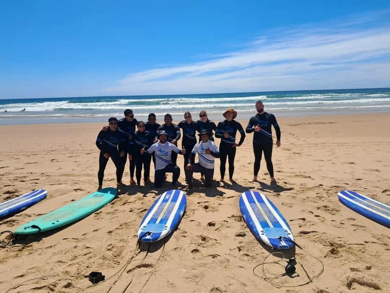 Lisbon: Surfing Lesson on Costa de Caparica Beach - Finding SurfChamp at Estacionamento: the grey Peugeot van detail that saves time