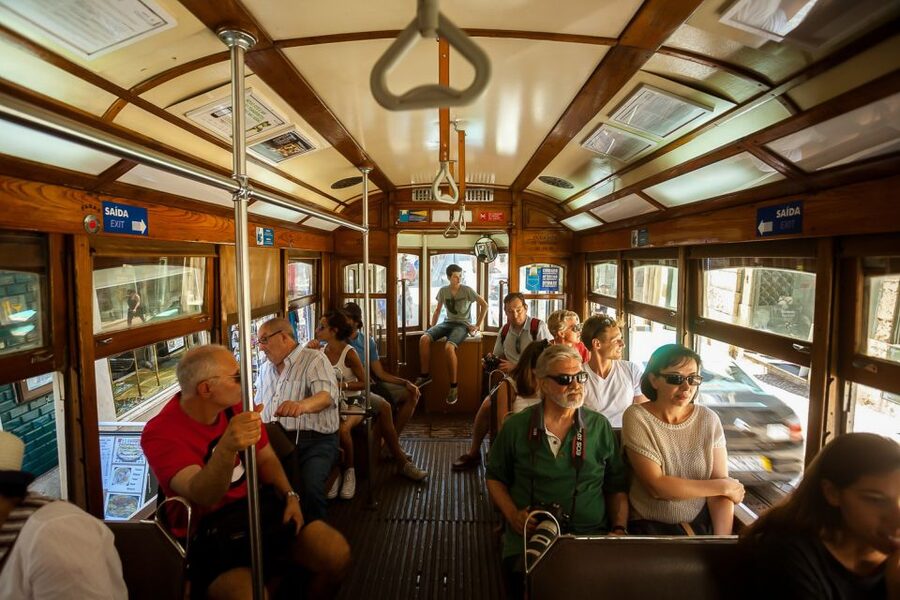 Lisbon Tram No. 28 Ride & Walking Tour - Alfama on foot: tiny squares, steep turns, and real street life