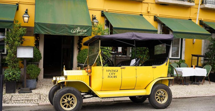 Lisbon: Tuk Tuk City tour with vintage car - Baixa de Lisboa on the 2-hour tour: plazas and central city flow