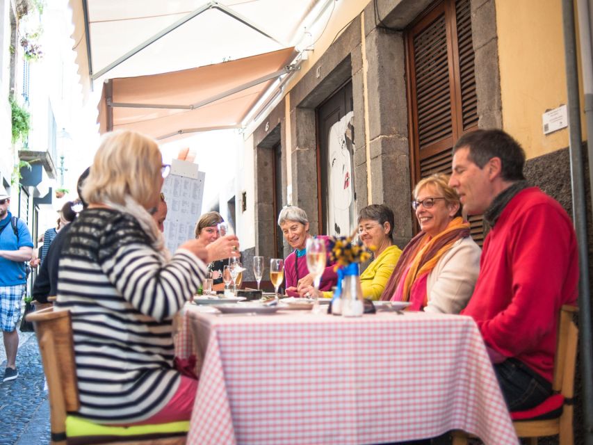 Madeira: Food and Wine Walking Tour in Funchal - Madeira wine tasting at the winery, Sercial and Malmsey explained