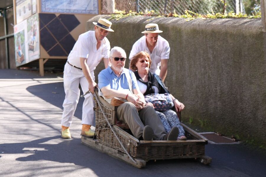 Madeira: Monte Sightseeing Tour & Toboggan Sled Ride - How pickup, guide language, and comfort affect your whole day