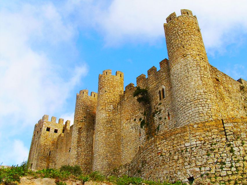 Óbidos, Nazaré & Alcobaça: Private Trip by Car - Óbidos: medieval walls, castle streets, and ginjinha