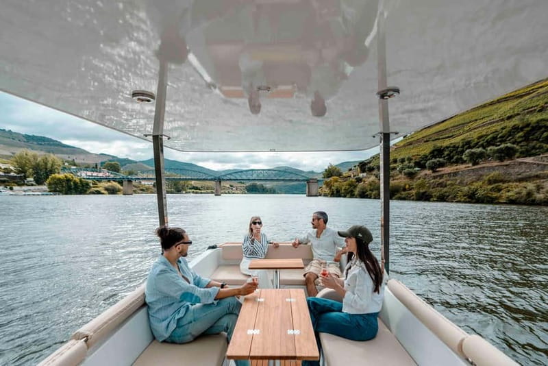 Pinhão: Douro River Solar Boat Tour with Wine Tasting - How the guide makes the ride more than just pretty