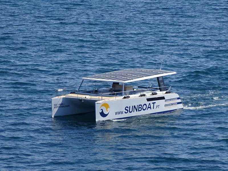 Portimão: Benagil Caves & Golden Coast Eco Catamaran Tour - Carvoeiro views and the calm cruise rhythm toward Benagil