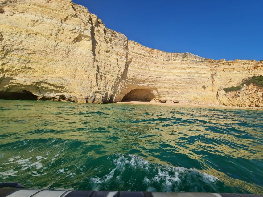Portimão: Guided Coastal Caves Tour by Boat - The cave-boat experience: seeing the rock from the inside