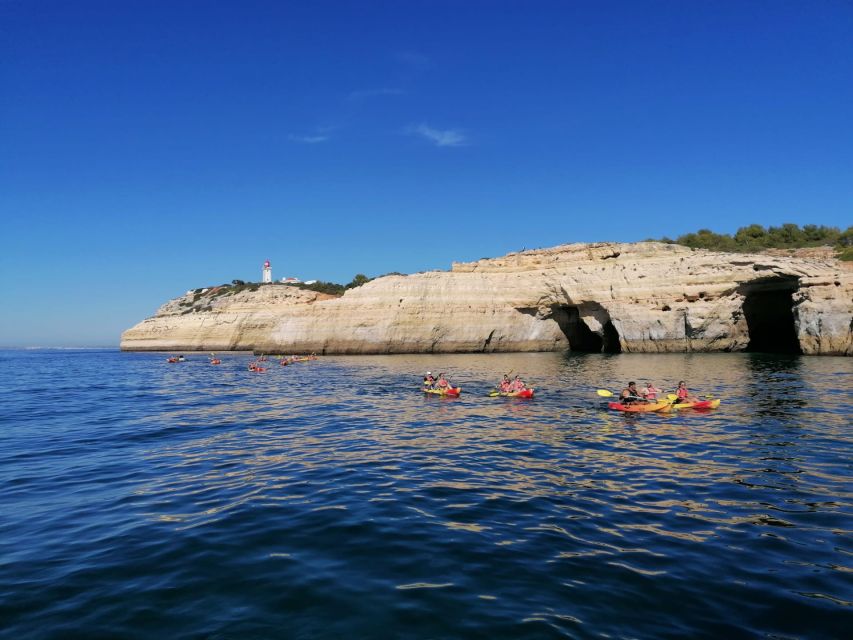 Portimão: Kayak Tour of Benagil Caves - The catamaran ride: scenery, stories, and a fun onboard vibe