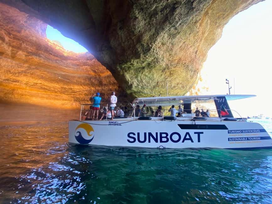 Portimao: SUNSET Benagil Caves Tour | Eco Catamaran - Before Benagil: cliffs, coves, and the Algarve in evening light
