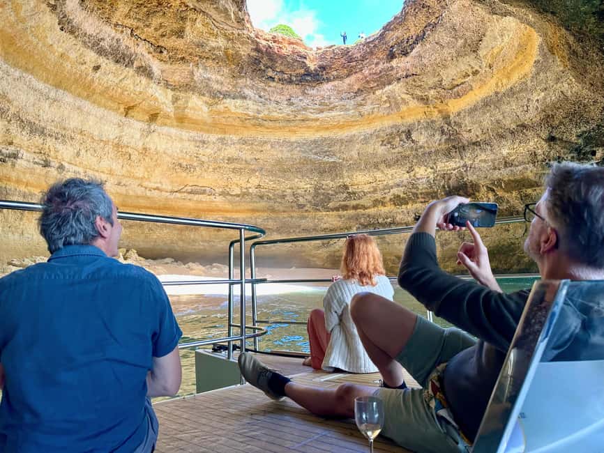 Portimao: SUNSET Benagil Caves Tour | Eco Catamaran - Going into the main Benagil Caves as the light changes