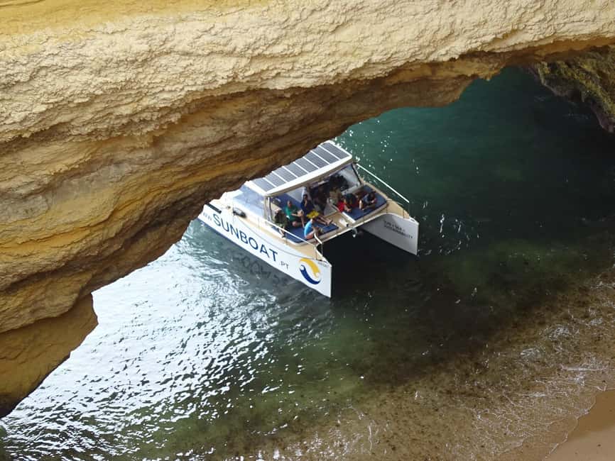Portimao: SUNSET Benagil Caves Tour | Eco Catamaran - The 3-hour eco catamaran comfort you’ll actually feel