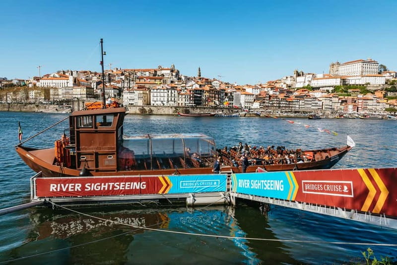 Porto: Bridges Cruise & Sunset & Port Wine Cellar Option - Audio guide on your phone, how to make the 50 minutes feel longer