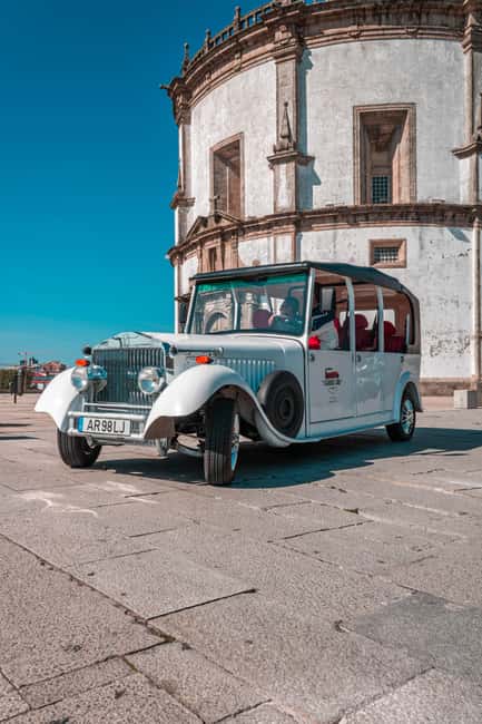 Porto: City Center Eco Car Tour - Price and logistics, without the guesswork