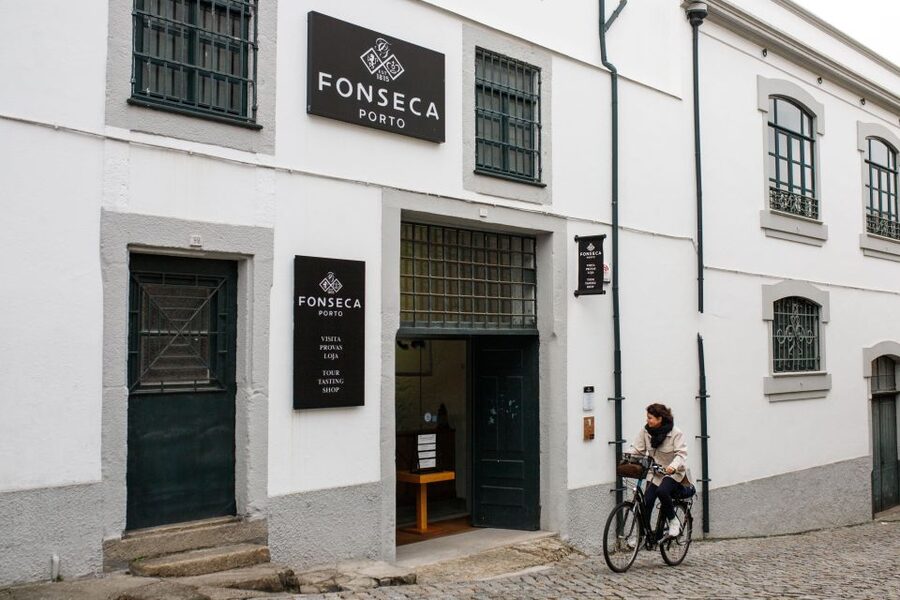 Porto: Fonseca Cellar Tour & Fado Show with Optional Dinner - Inside the Fonseca cellars: 1815, Douro origins, and how Port is made