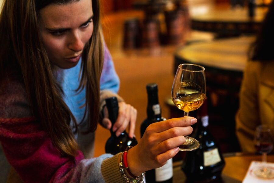 Porto: Food & Wine Tasting Walking Tour with Port Wine Cave - Inside the Port caves: touring the world’s oldest Portuguese Port wine cellar