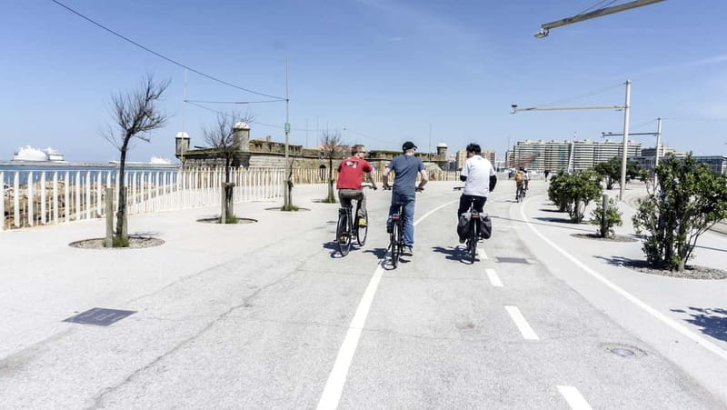 Porto Private E-Bike Tour: Douro River, Parks & Beaches - The ride along the Douro River: Alfândega, Cais das Pedras, and bridges