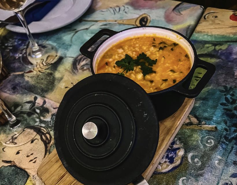 Porto: Walking Dinner Tour with Family-Owned Restaurants - The First Stop: A Local Tasca and Green Wine With the Father and Son
