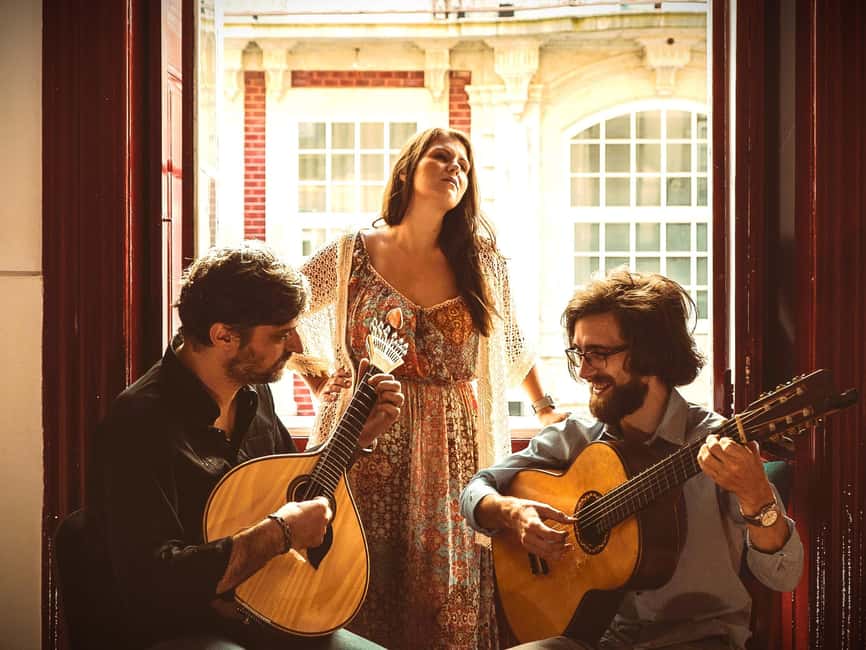 Porto: What is Fado? Commented Live Concert with Port Wine - The 19th-Century Auditorium Near the Douro River