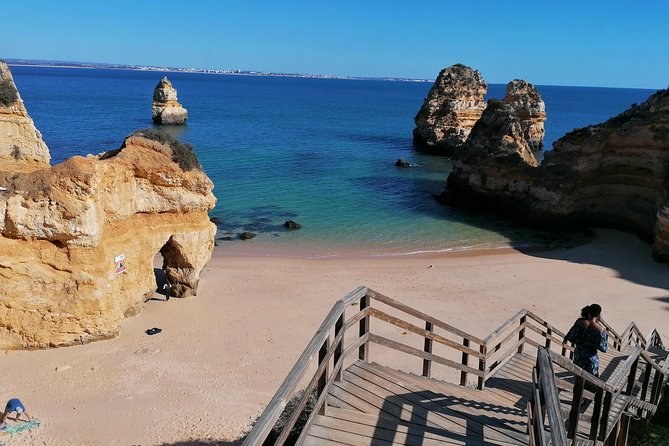 Private Algarve: Benagil Caves, Lagos Cliffs & Hidden Beaches - Praia do Camilo and Praia dos Estudantes: hidden coves with stairs and a cliff tunnel