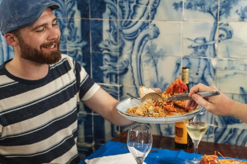 Private Lisbon Food Tour in Baixa with Wine & Local Delights - Rua da Vitória: petiscos and the feeling of neighborhood dining