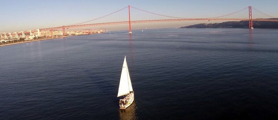 Private Romantic cruise with sparkling wine- 2-Hour- Lisbon - What the Skipper Does While You Relax (Not Just Drive)