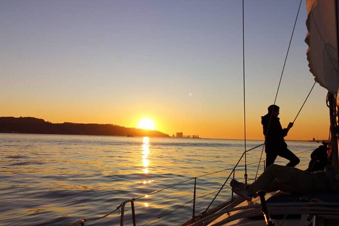 Sailboat Tour in Lisbon with drinks included | Morning and Sunset - Boarding day feel: small group, active crew, real deck time