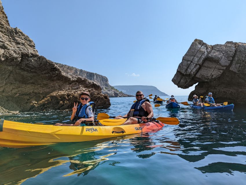Sesimbra: Arrabida Natural Park & Caves Guided Kayaking Tour - Ribeiro do Cavalo beach break: swim time and traditional sweets