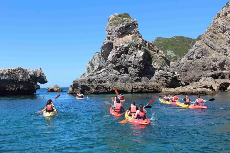 Sesimbra: Ribeiro Cavalo Beach, Caves, & Arrábida Kayak Tour - Sesimbra kayak-cave tour, where the coastline turns dramatic